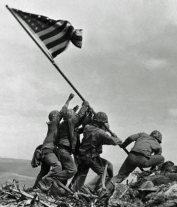 Second flag raising on Mt Suribachi Iwo Jima.